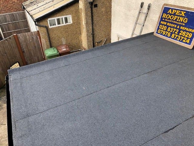 Flat roof section resurfaced with new waterproof felt